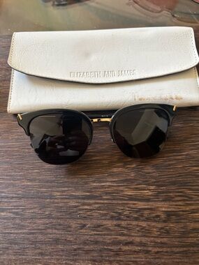 Elizabeth and James Black Sunglasses with White Case